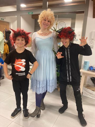 Participants dressed as an angel and devils