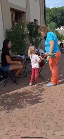 Outdoor community activity with a child
