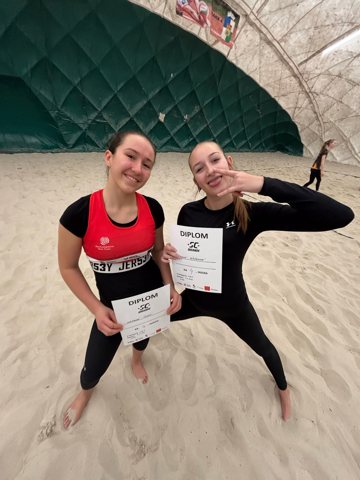 Celebrating with tournament certificates